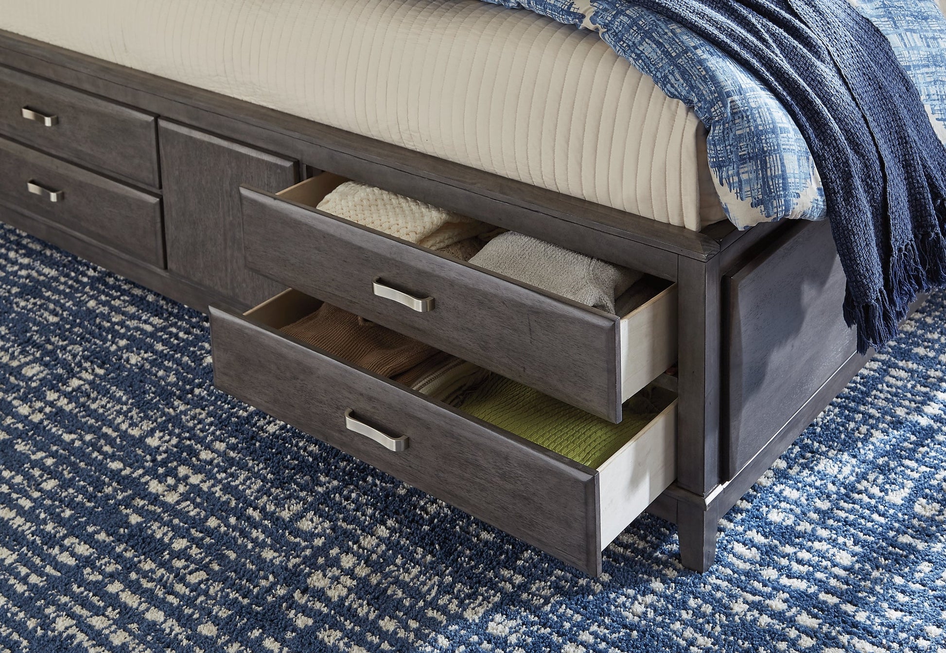 Caitbrook Queen Storage Bed with 8 Drawers with Dresser and Chest at Walker Mattress and Furniture Locations in Cedar Park and Belton TX.