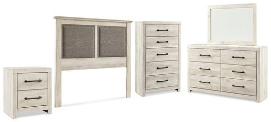 Cambeck King/California King Upholstered Panel Headboard with Mirrored Dresser, Chest and Nightstand at Walker Mattress and Furniture Locations in Cedar Park and Belton TX.