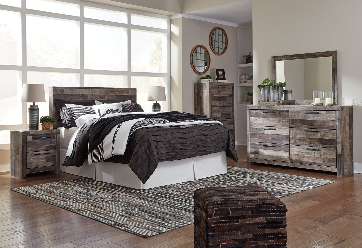 Derekson Queen/Full Panel Headboard with Mirrored Dresser, Chest and Nightstand at Walker Mattress and Furniture Locations in Cedar Park and Belton TX.