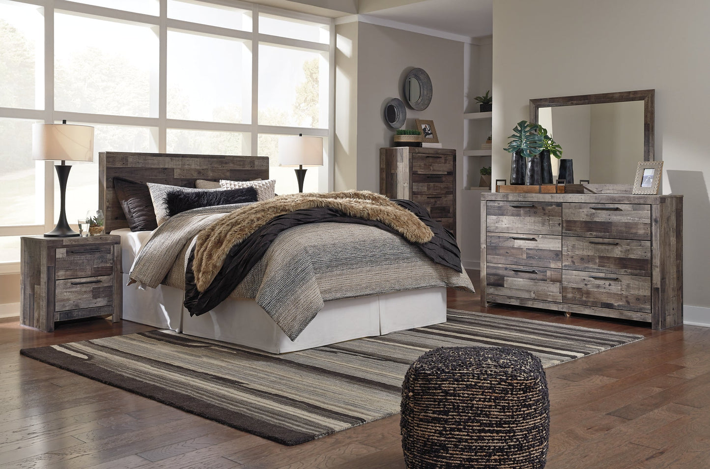 Derekson Queen/Full Panel Headboard with Mirrored Dresser, Chest and Nightstand at Walker Mattress and Furniture Locations in Cedar Park and Belton TX.