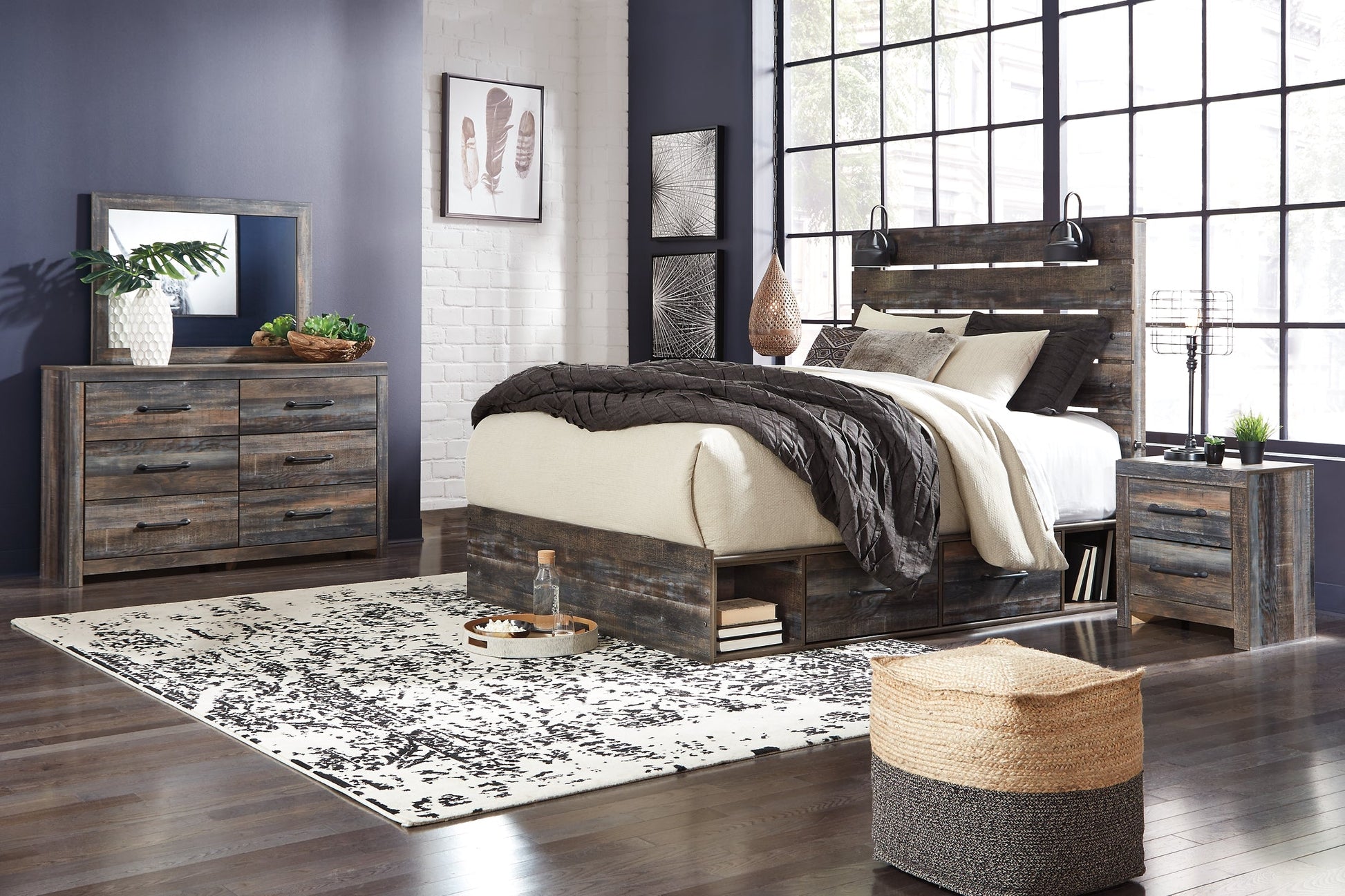 Drystan King Panel Bed with 4 Storage Drawers with Mirrored Dresser, Chest and Nightstand at Walker Mattress and Furniture Locations in Cedar Park and Belton TX.