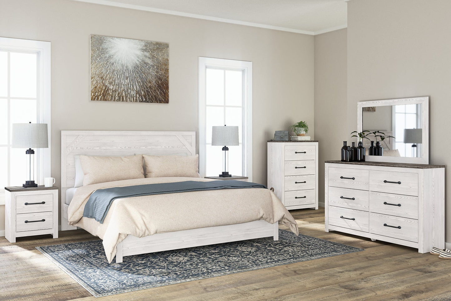 Gerridan King Panel Bed with Mirrored Dresser, Chest and Nightstand at Walker Mattress and Furniture Locations in Cedar Park and Belton TX.