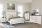 Gerridan Queen Panel Bed with Mirrored Dresser and Chest at Walker Mattress and Furniture Locations in Cedar Park and Belton TX.