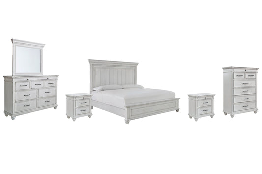 Kanwyn King Panel Bed with Mirrored Dresser, Chest and 2 Nightstands at Walker Mattress and Furniture Locations in Cedar Park and Belton TX.